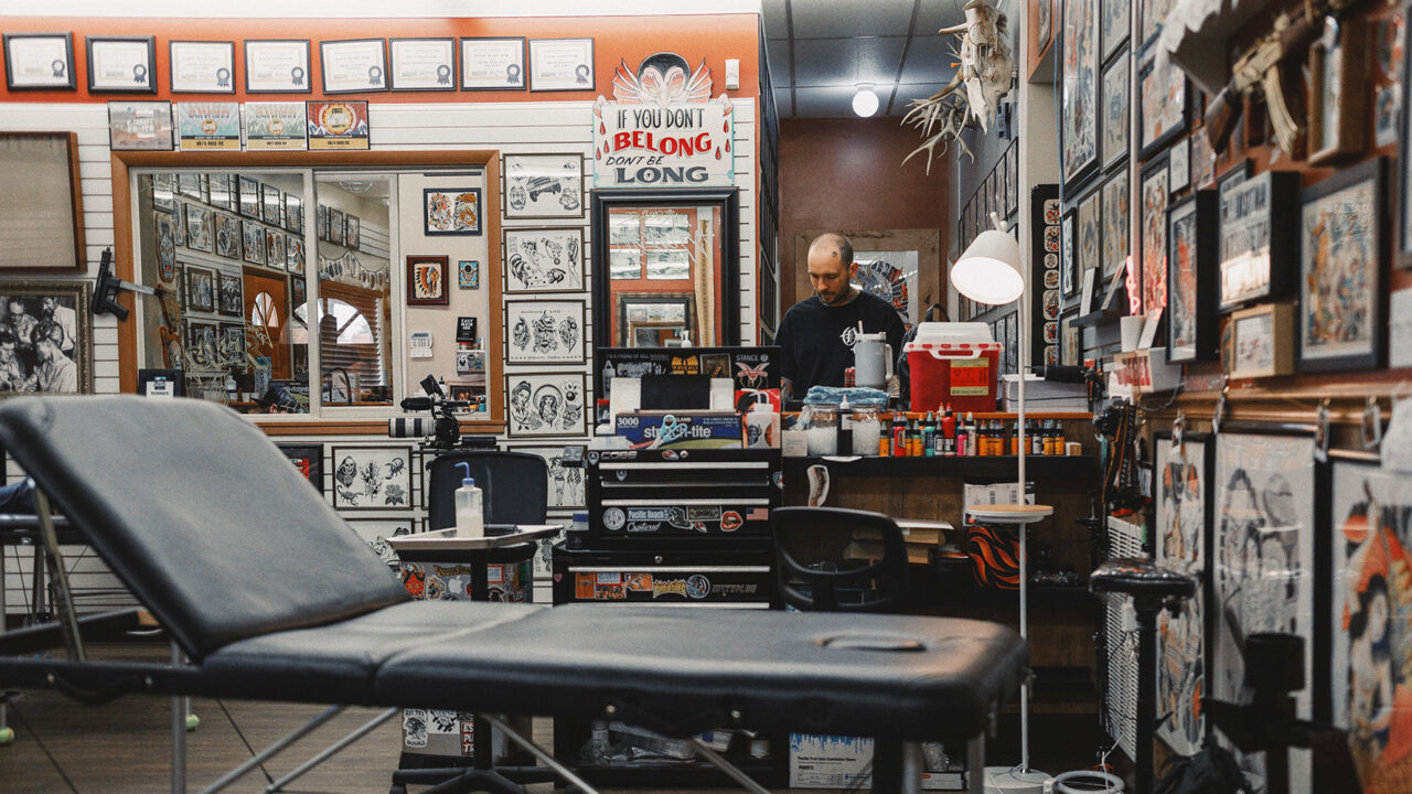 Inside Sample Tattoo Shop, a tattoo studio in Cancun